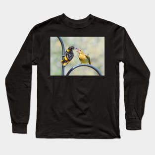 Oriole feeding fledgling.. Long Sleeve T-Shirt